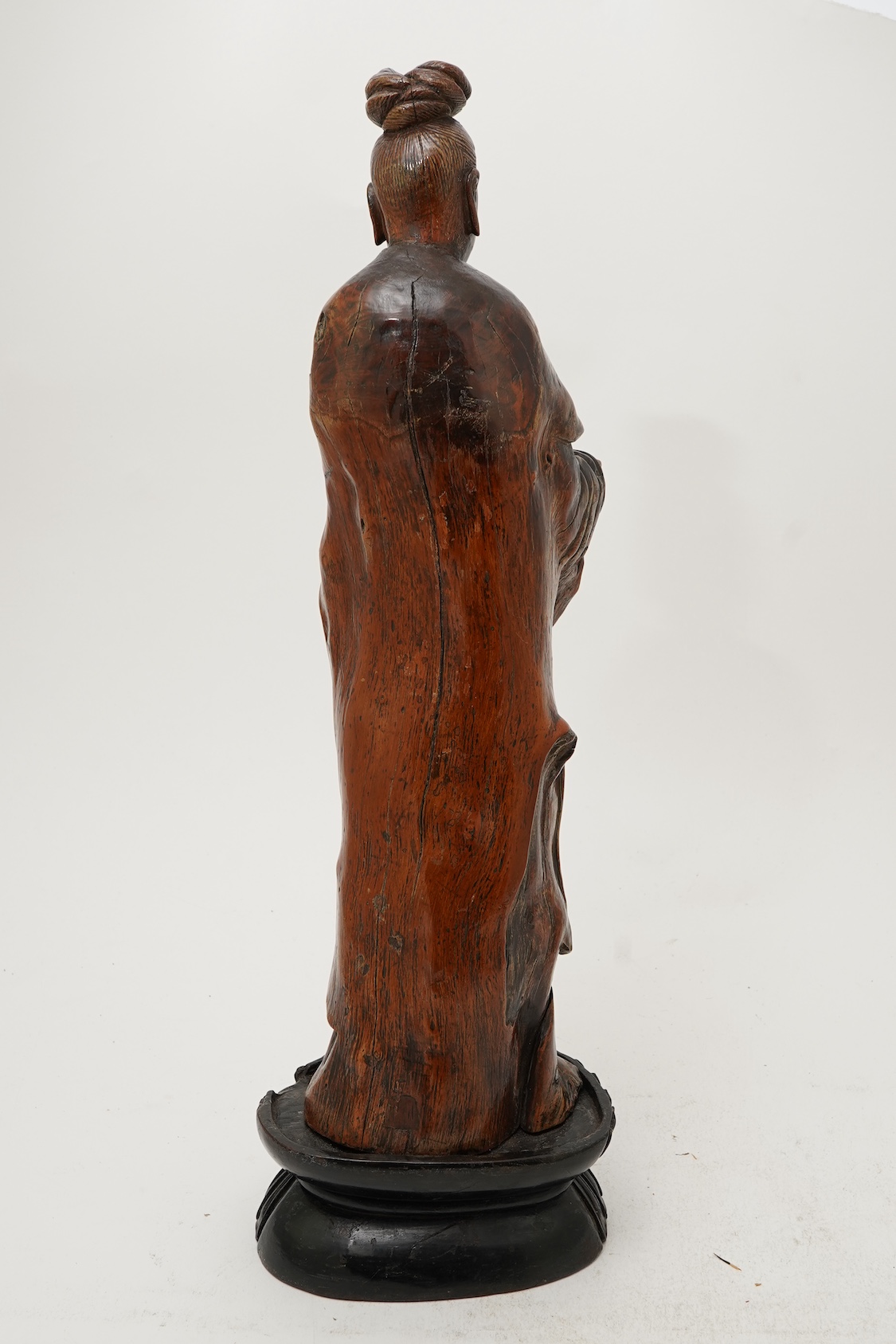 A Chinese rootwood standing figure of Guanyin, 18th/19th century